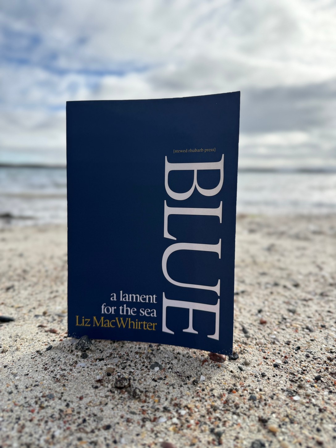 A poetry pamphlet on the sand